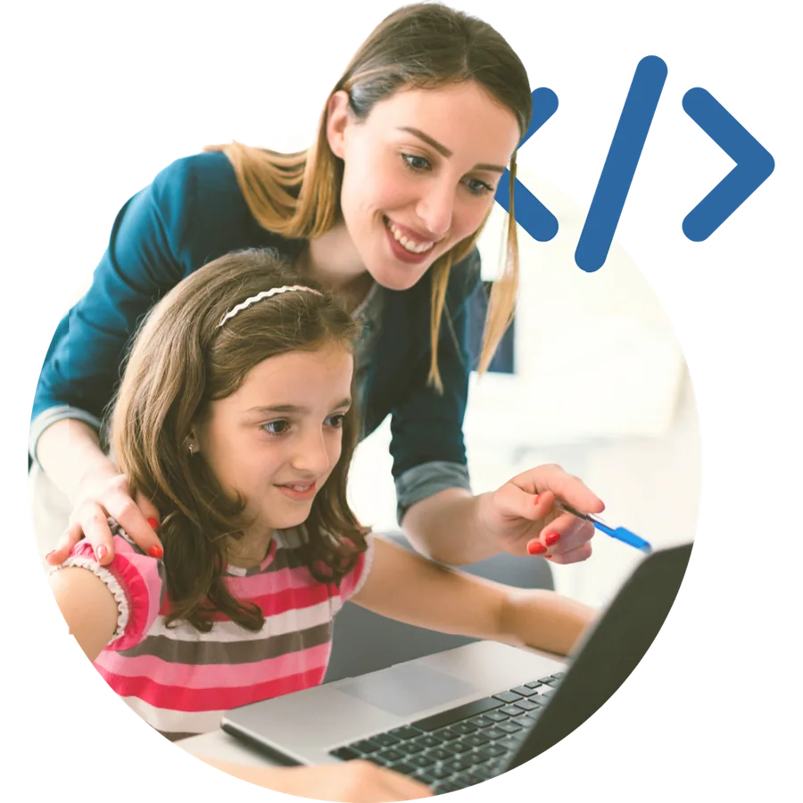 Teacher helping a girl with code on a laptop
